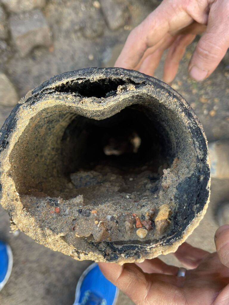 Photo of compacted pitch fibre drain pipe
