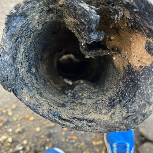 Photo of degraded pitch fibre drain pipe
